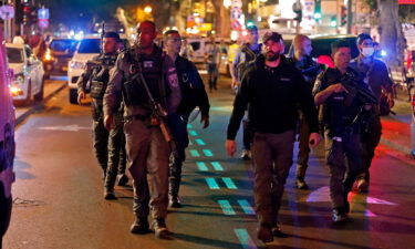 Israeli security forces gather at the scene of a shooting on Dizengoff Street in Tel Aviv on Thursday.