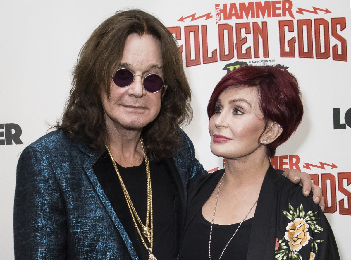 <i>Vianney Le Caer/Invision/AP</i><br/>Ozzy Osbourne (L) and his wife Sharon Osbourne are seen here in London in June 2018. Sharon Osbourne is taking some time off from her new talk show after revealing her husband has Covid-19.