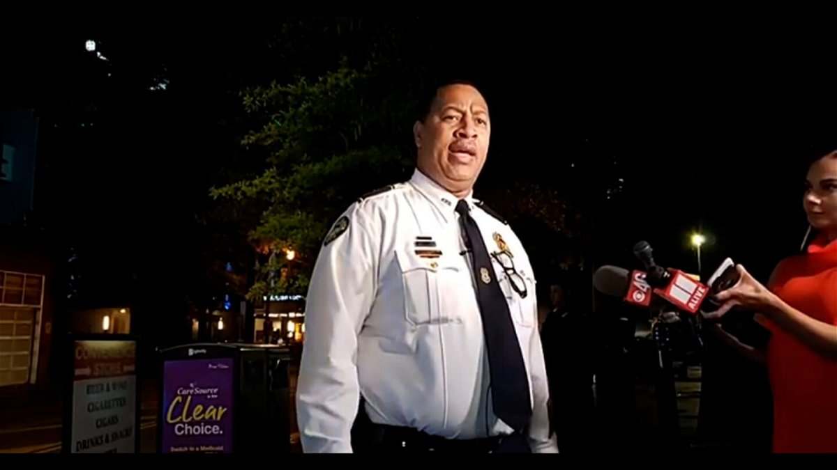 <i>Atlanta Police Department</i><br/>Atlanta Police Deputy Chief Timothy Peek briefs reporters on a shooting near Centennial Olympic Park.
