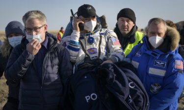 NASA astronaut Mark Vande Hei is carried to a medical tent shortly after he and fellow crew mates Pyotr Dubrov and Anton Shkaplerov of Roscosmos landed in their Soyuz MS-19 spacecraft near the town of Zhezkazgan on March 30