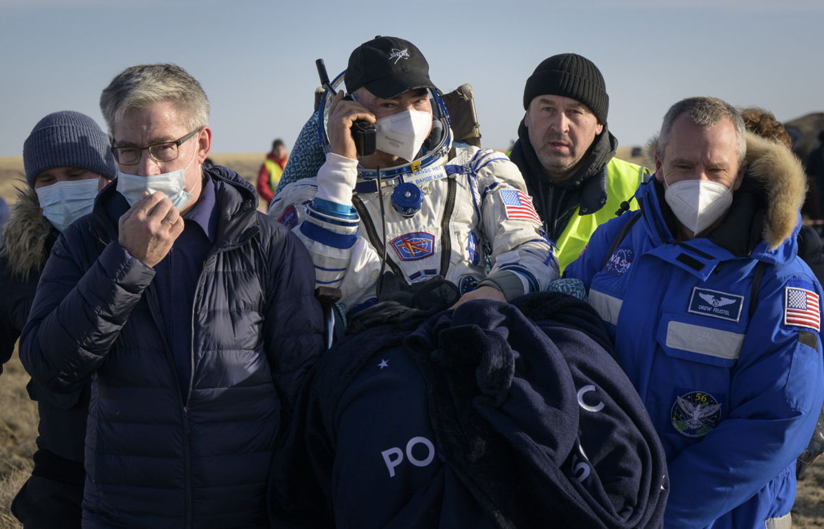 <i>Getty Images</i><br/>NASA astronaut Mark Vande Hei is carried to a medical tent shortly after he and fellow crew mates Pyotr Dubrov and Anton Shkaplerov of Roscosmos landed in their Soyuz MS-19 spacecraft near the town of Zhezkazgan on March 30