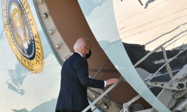 US President Joe Biden boards Air Force One before departing from Joint Base Andrews in Maryland on April 19. Biden on April 21 issued a clarification after mixing up the federal transportation mask mandate and a pandemic-era restriction at the US border while answering questions from reporters at the White House.