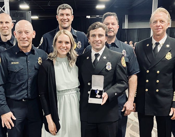 Bend firefighter honored by Oregon fire chiefs for rescuing woman from house fire
