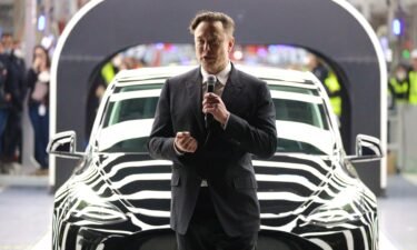 Tesla CEO Elon Musk speaks during the official opening of the new Tesla electric car manufacturing plant on March 22