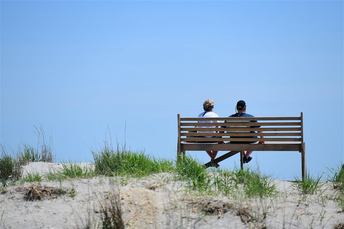<i>Mark Makela/Getty Images</i><br/>A couple gazes towards the ocean on May 30 in Atlantic City
