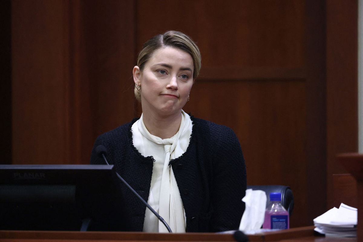 <i>Jim Lo Scalzo/Pool/AFP/Getty Images</i><br/>Amber Heard testifies: 'Nothing I did made him stop hitting me'