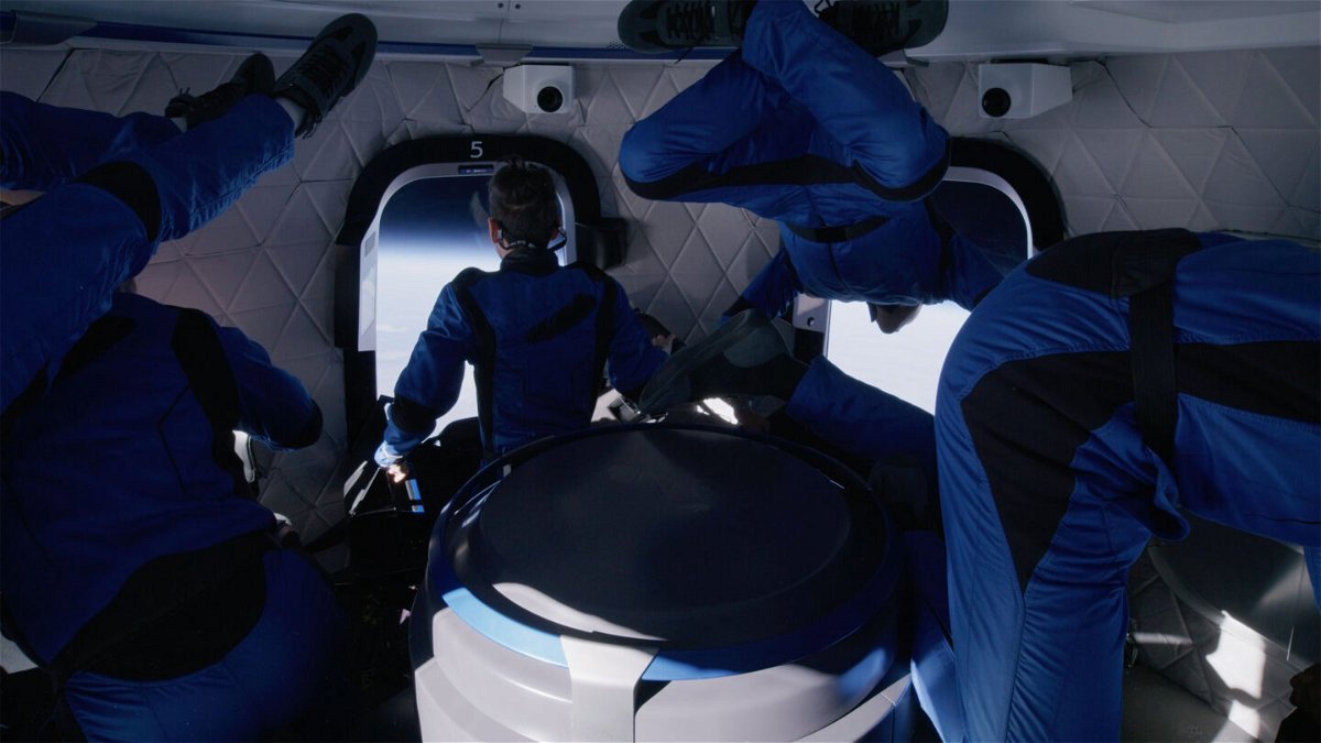 <i>Dylan Taylor/Blue Origin</i><br/>Bess looks out the window as the passengers experience Zero-G at the top of New Shepard's flight path.