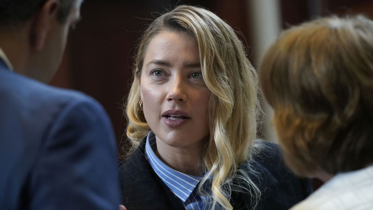 <i>Elizabeth Frantz/Pool/AFP/Getty Images</i><br/>Amber Heard