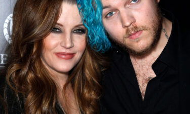 Lisa Marie Presley posted praise for the movie "Elvis" on Instagram but began her message by talking about grief and the loss of her son Benjamin Keough (R)