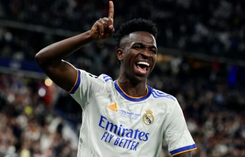 Real Madrid's Brazilian forward Vinicius Junior celebrates scoring the opening goal during the UEFA Champions League final football match between Liverpool and Real Madrid at the Stade de France in Saint-Denis