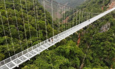 This aerial photo shows the newly constructed Bach Long glass bridge in Moc Chau district in Vietnam's Son La province on April 29.