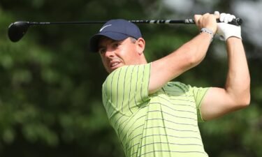 McIlroy plays his shot from the 17th tee during the first round of the 2022 PGA Championship.