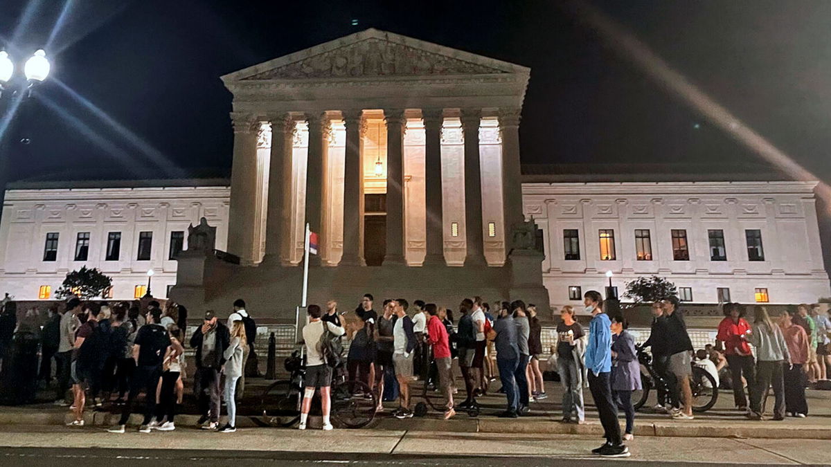 <i>Anna Johnson/AP</i><br/>These are the US states where abortion rights could be under threat if Roe v. Wade is overturned. A crowd of people is seen gathering outside the Supreme Court on May 2.