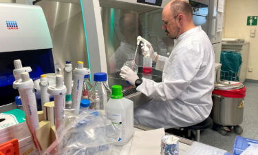 Head of the Institute of Microbiology of the German Armed Forces Roman Woelfel works in his laboratory in Munich on May 20 after Germany detected its first case of monkeypox.