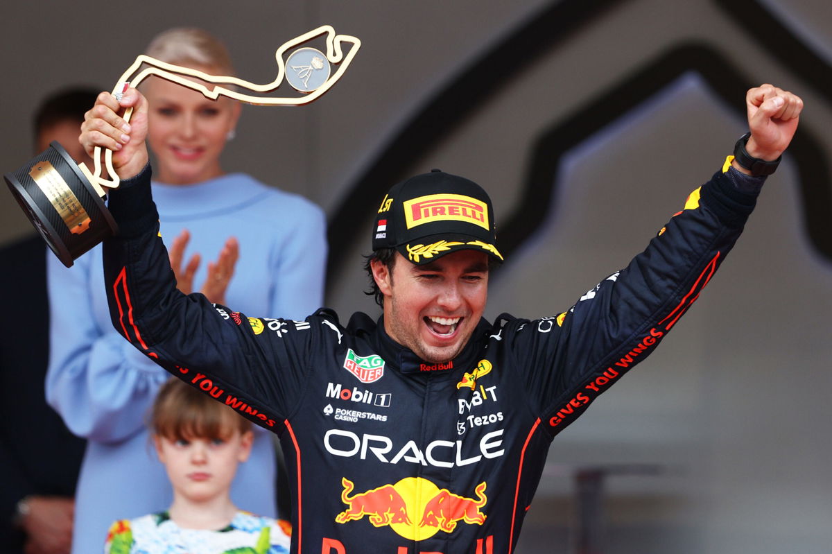 <i>Clive Rose/Getty Images Europe/Getty Images</i><br/>Race winner Sergio Pérez celebrates on the podium in Monte Carlo