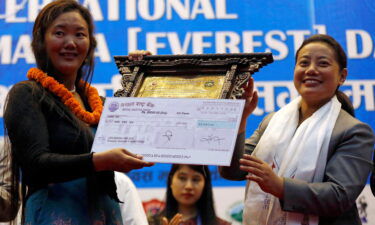 48-year-old Nepali woman Lhakpa Sherpa (left) scaled Mount Everest for the 10th time on May 12