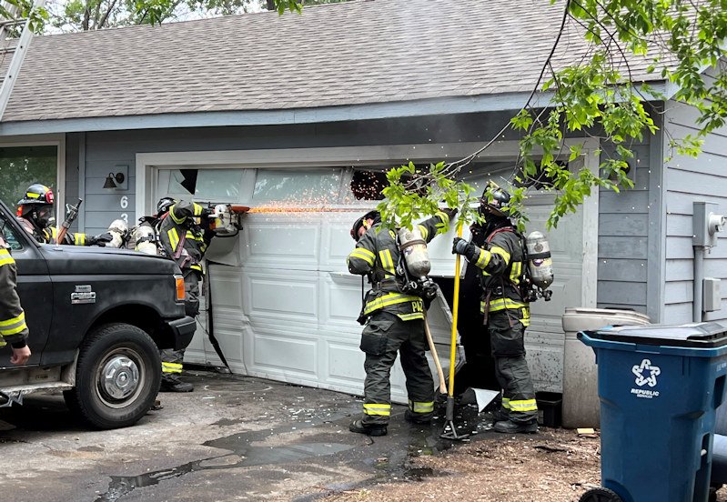 Bend firefighters cut garage door Hunters Circle house fire 618