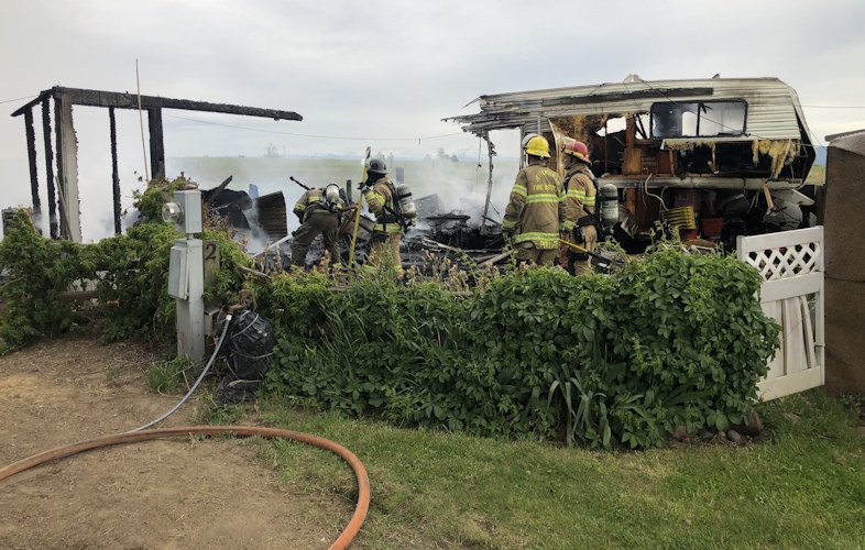Jefferson County firefighters could not save shed, RV destroyed by fire Thursday evening but did protect a nearby trailer