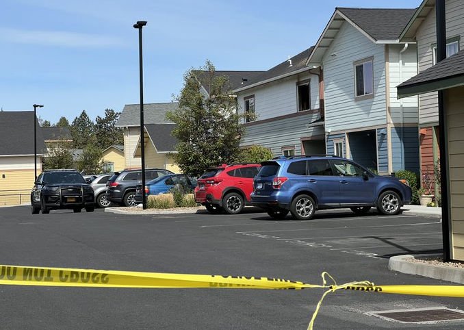 Body found in burning NE Bend townhome; arson suspected, person of interest in custody