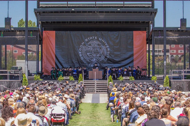 Past OSU-Cascades graduation ceremonies have taken place at Les Schwab Amphitheater, Drake Park, COCC track
