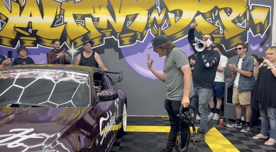 19 car shops come together to surprise young autistic photographer from Redmond with his dream car