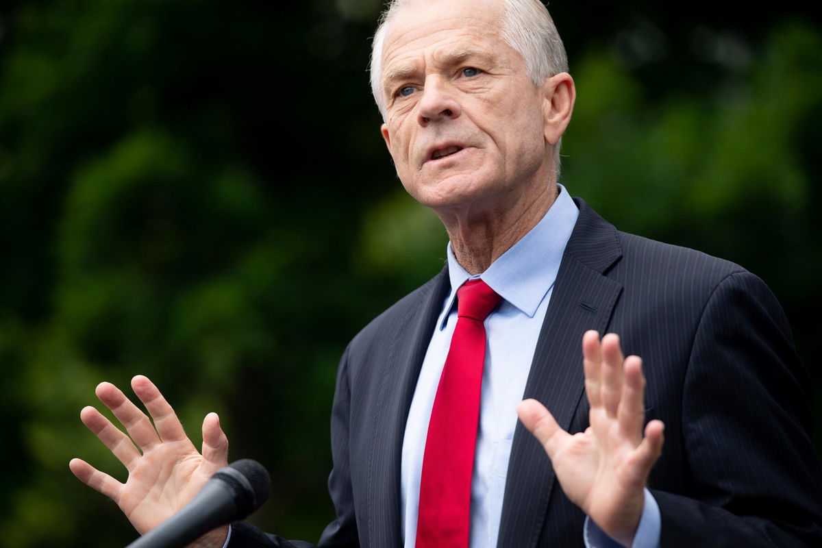 <i>SAUL LOEB/AFP/Getty Images</i><br/>Peter Navarro speaks to the press outside of the White House in June 2020. Navarro wanted his first phone call after his arrest for contempt of Congress to be to a TV network