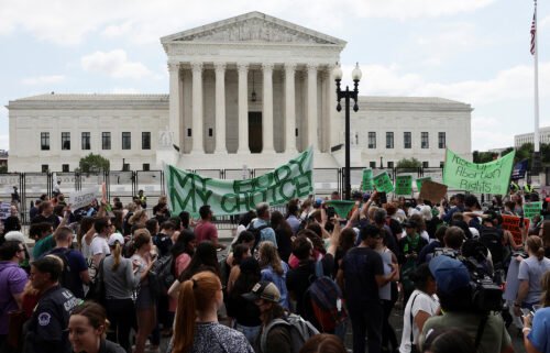 Abortion rights demonstrators protest outside the United States Supreme Court as the court announced its ruling to overturn the landmark Roe v Wade abortion decision.
