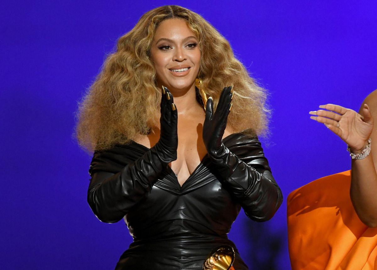 <i>Kevin Winter/Getty Images</i><br/>Beyoncé accepts the best rap performance award for 'Savage' onstage during the 63rd Annual Grammy Awards in March 2021 in Los Angeles. Beyoncé's new single 'Break My Soul' pays homage to house music's Black queer roots.