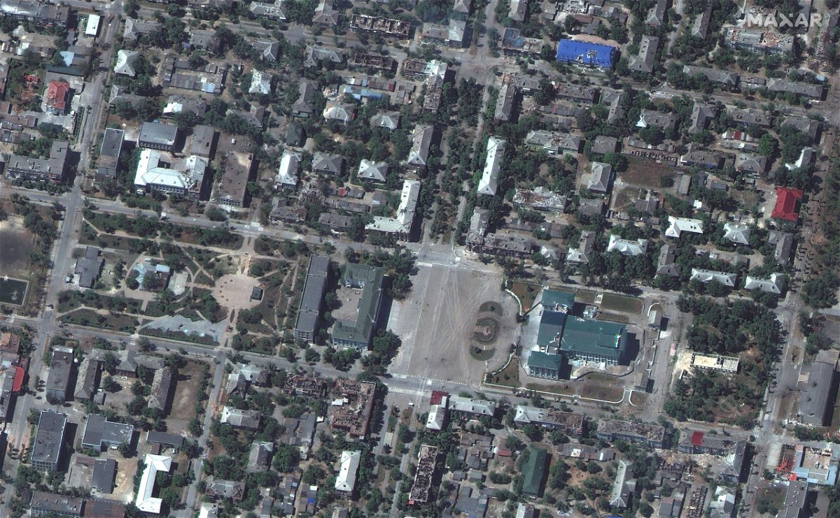 <i>Maxar Technologies/Reuters</i><br/>A satellite image shows damaged buildings near Chemist's Palace of Culture in downtown Severodonetsk on June 6