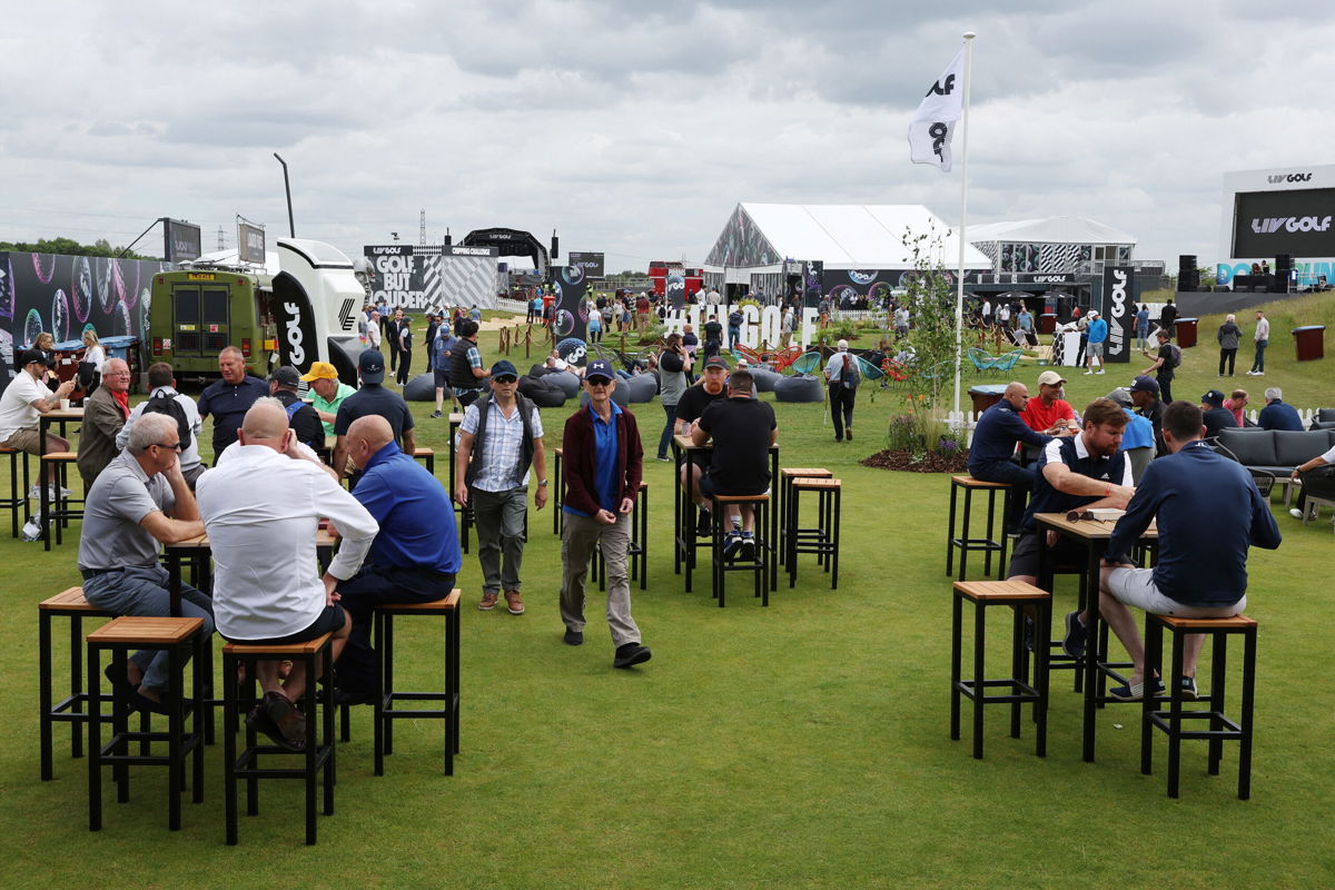 <i>Paul Childs/Action Images/Reuters</i><br/>Specators enjoy the fan zone ahead of the start of the inaugural LIV Golf event.