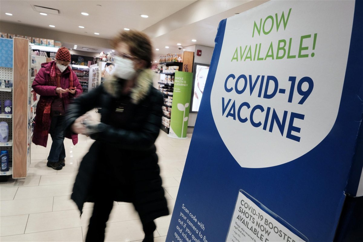 <i>Spencer Platt/Getty Images North America/Getty Images</i><br/>A pharmacy in Grand Central Terminal advertises the COVID-19 vaccine on December 9
