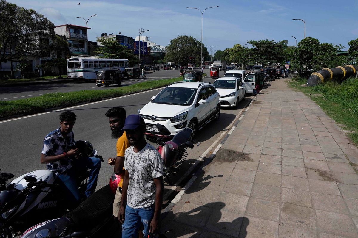 <i>Eranga Jayawardena/AP</i><br/>Motorists wait in a queue expecting to buy fuel in Colombo