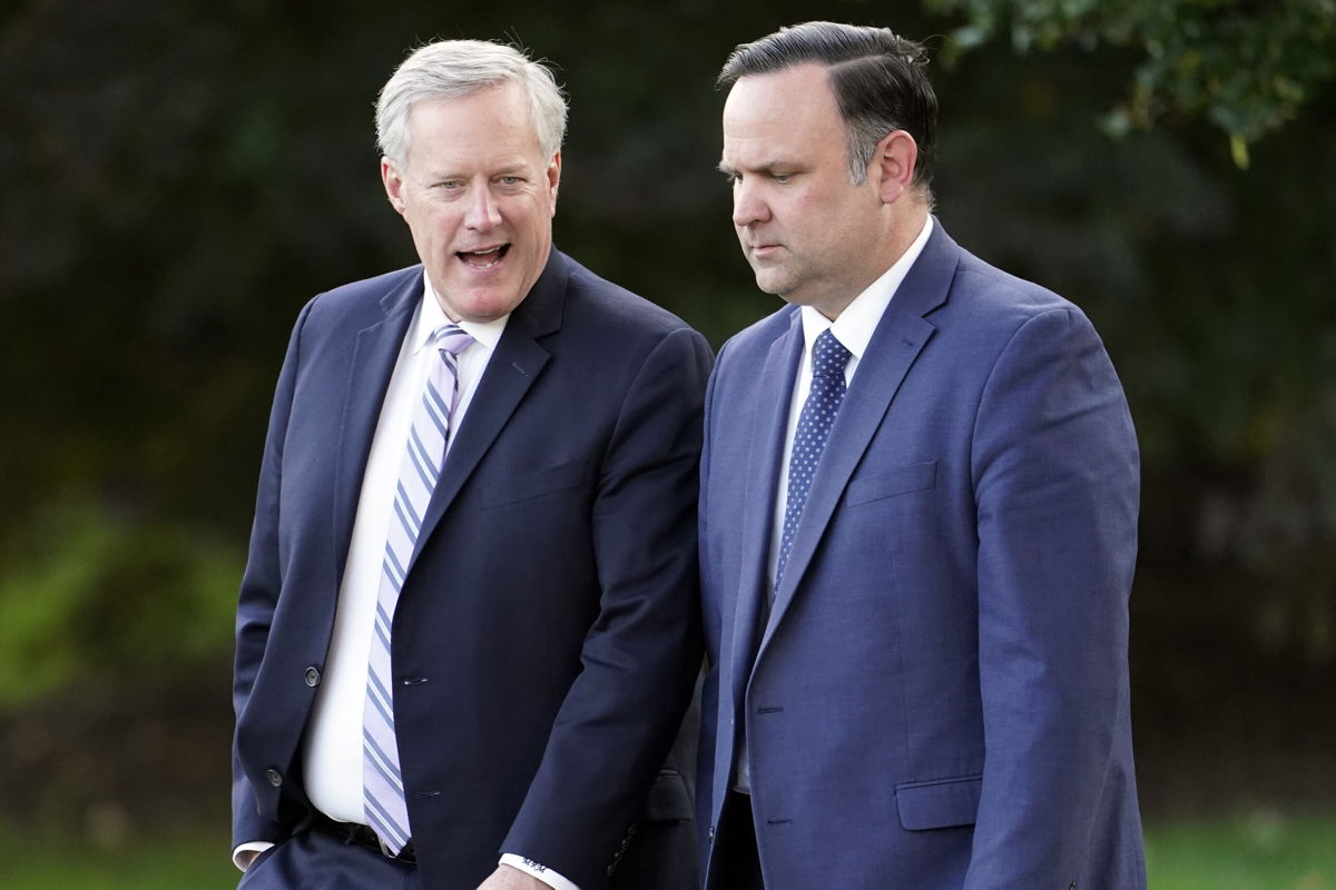 <i>Andrew Harnik/AP</i><br/>White House chief of staff Mark Meadows and White House social media director Dan Scavino walk to board Marine One on the South Lawn of the White House