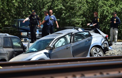 Contra Costa Sheriff deputies investigate the scene after an Amtrak train collided with a vehicle in Brentwood