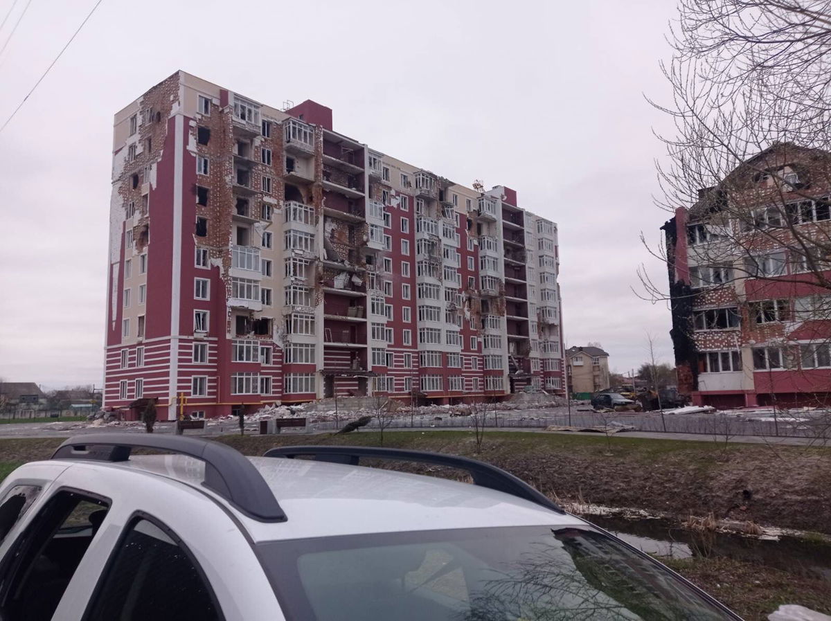 <i>Courtesy Rostislav Skuratovskiy</i><br/>The white car in which the mayor was traveling is seen abandoned near the Pokrovsky residential complex.