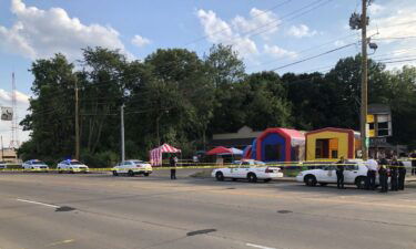 An 8-year-old girl and a 10-year-old boy were injured after being shot in bouncy houses during a Fourth of July cookout