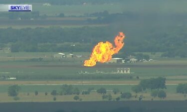 Emergency crews brought the flames from a pipeline explosion in Wallis in Fort Bend County under control about an hour after it occurred.