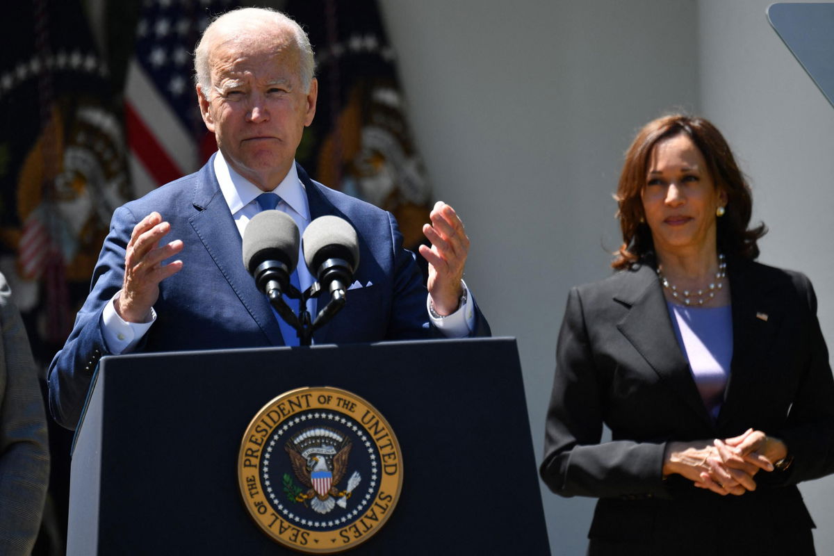 <i>Nicholas Kamm/AFP/Getty Images</i><br/>Vice President Kamala Harris listens as President Joe Biden delivers in the Rose Garden of the White House in Washington on May 9