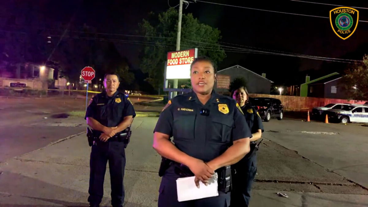 <i>Houston Police</i><br/>Houston assistant police chief Chandra Hatcher briefs the media on the double shooting.