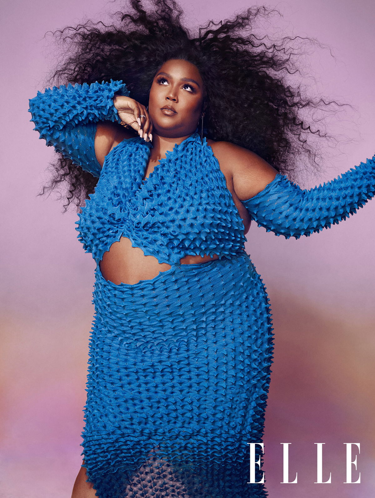 <i>AB+DM/Elle UK</i><br/>Lizzo opened up about how long it's taken her as a darker-skinned and plus-sized entertainer to feel comfortable with herself.