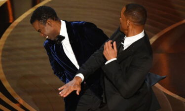 Will Smith and Chris Rock on stage at the Oscars.