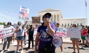 Abortion-rights activists protest outside the Supreme Court in Washington
