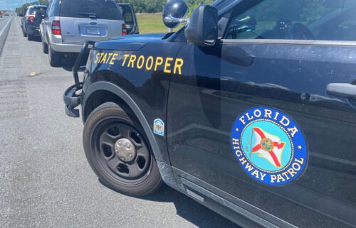 The Florida Highway Patrol makes an arrest on June 29. The Florida Highway Patrol arrested two people this week for smuggling others into the state