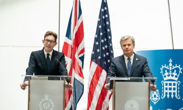 MI5 Director General Ken McCallum (left) and FBI Director Christopher Wray on July 6 in London.