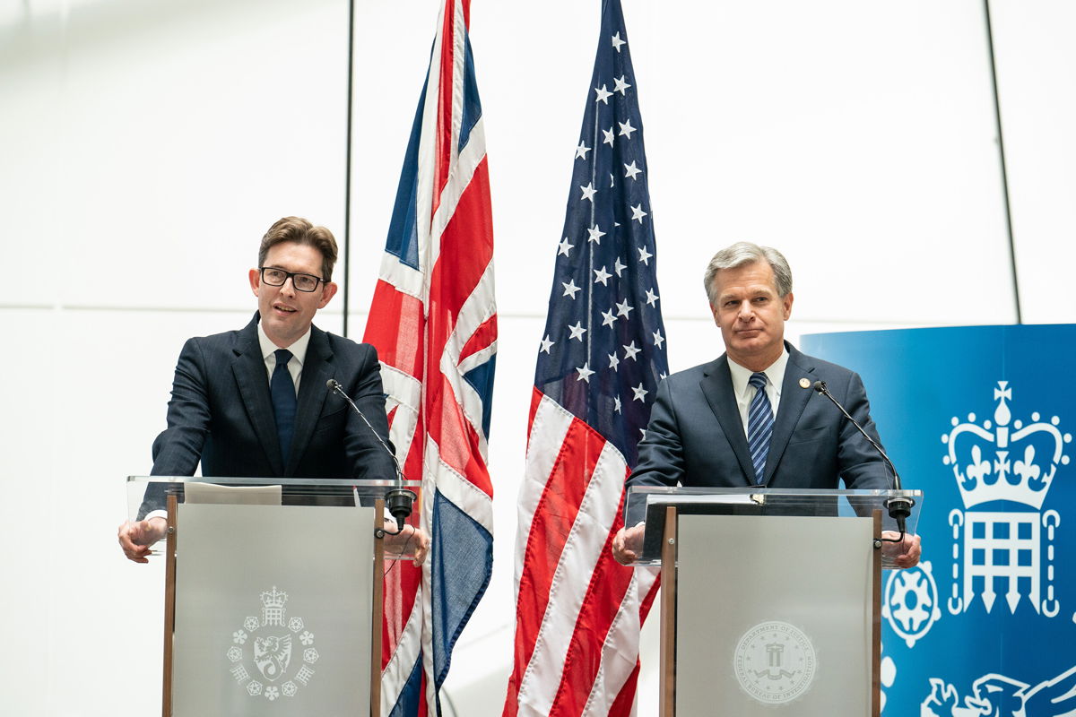 <i>Dominic Lipinski/PA Images/Getty Images</i><br/>MI5 Director General Ken McCallum (left) and FBI Director Christopher Wray on July 6 in London.