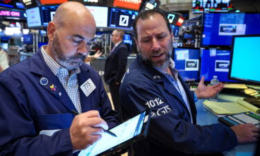 Traders work on the floor of the New York Stock Exchange (NYSE) in New York City