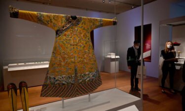 A festive robe from the Qianlong period (1736 to 1795) is displayed during a media preview of the Hong Kong Palace Museum in Hong Kong on June 22.