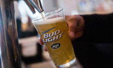 A bud light beer is poured from the tap at a bar on October 9