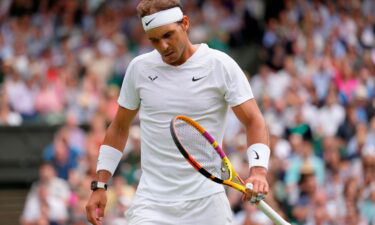 Spain's Rafael Nadal reacts after losing a point as he plays Taylor Fritz of the US in a men's singles quarterfinal match on day 10 of the Wimbledon tennis championships in London