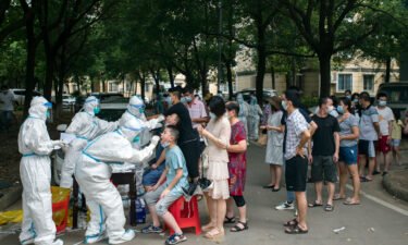 Residents line up to be tested for Covid-19 in Wuhan
